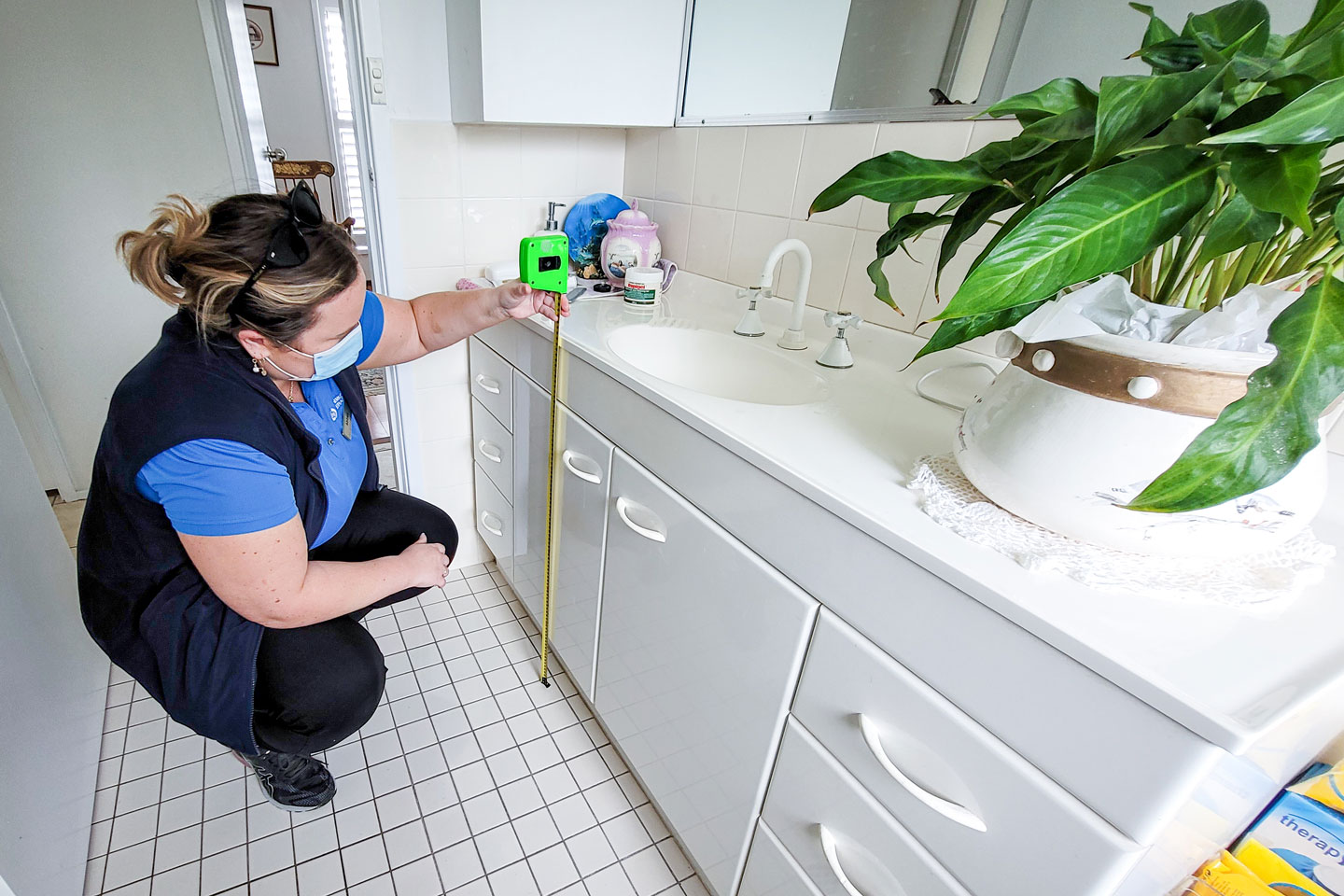 Occupational Therapist measuring a vanity